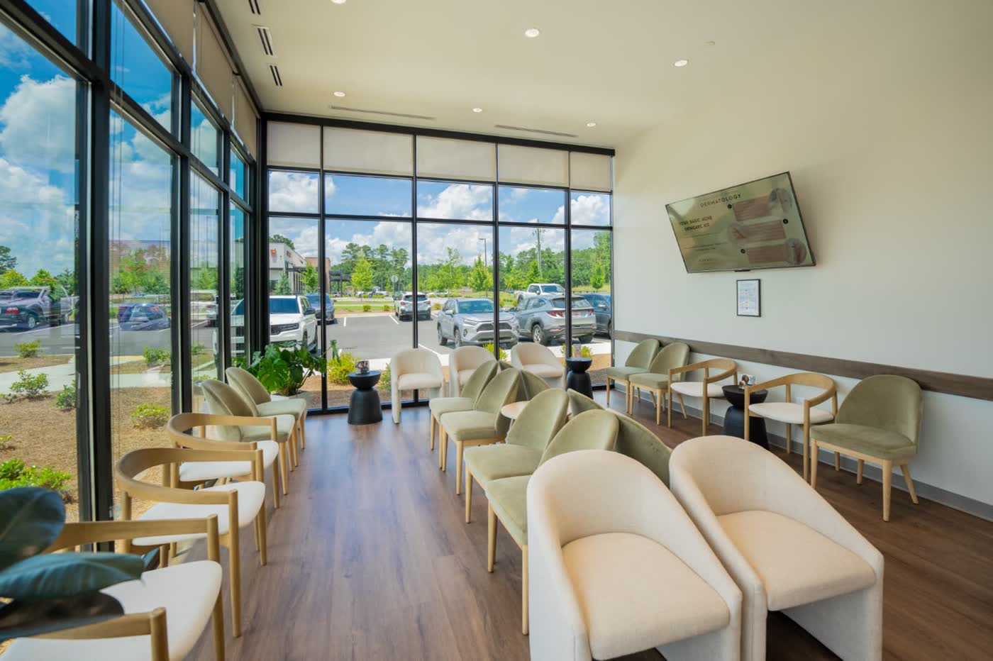 The waiting lounge with armchairs and natural light